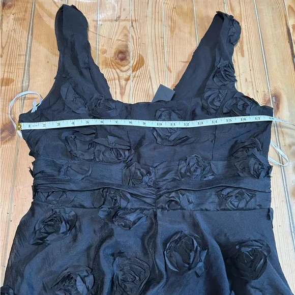 Exceptional Entrance Black Sleeveless Tiered Rosette Midi Dress - Picture 3 of 9